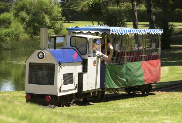 Rex Eastham behind the wheel of train at the Adventure Playground that he drove for many years